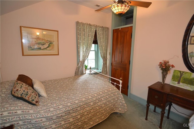 bedroom with visible vents, ceiling fan, and carpet flooring