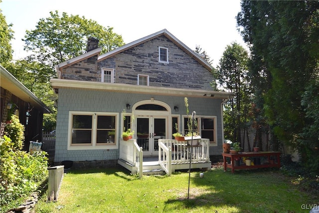 1321 Main St, Chapman, PA 18014 - back of property featuring french doors, a chimney, and a yard