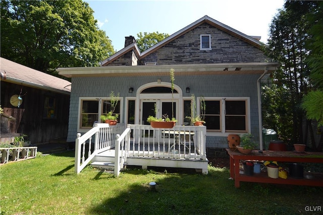 1321 Main St, Chapman, PA 18014 - rear view of property with a chimney, a yard, and a wooden deck