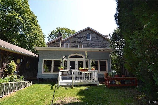 1321 Main St, Chapman, PA 18014 - back of house with a deck, a yard, and a chimney
