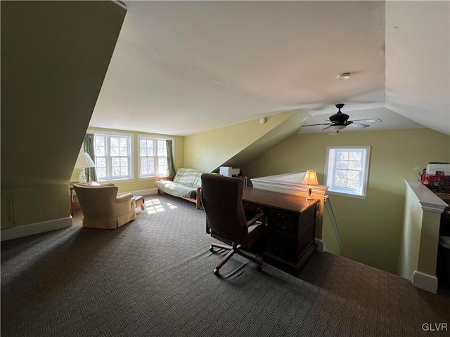 home office with carpet floors, lofted ceiling, a healthy amount of sunlight, and a ceiling fan