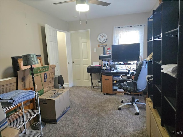 office area with ceiling fan and carpet floors