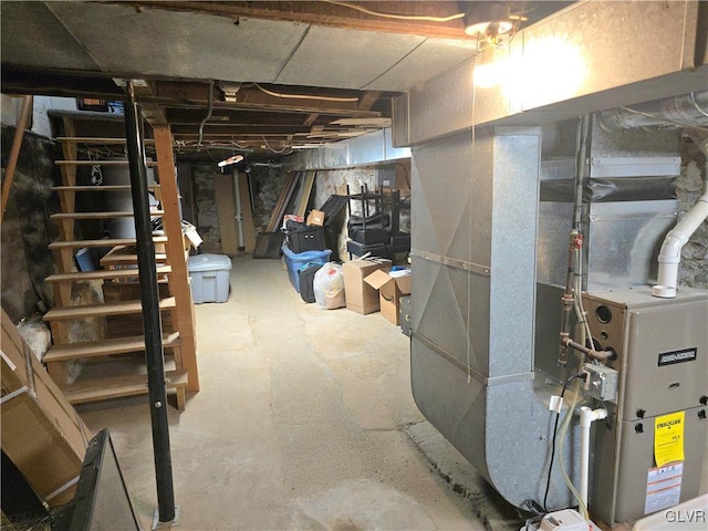 basement featuring heating unit