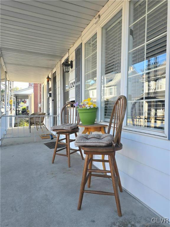 view of patio featuring a porch