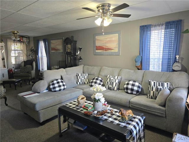 carpeted living room featuring ceiling fan