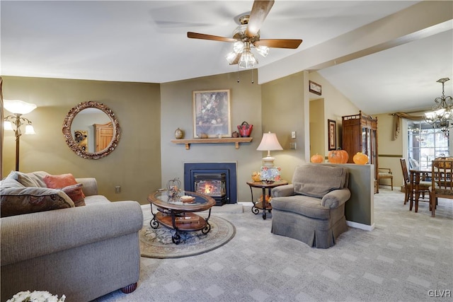 living room featuring vaulted ceiling with beams, light colored carpet, and ceiling fan with notable chandelier