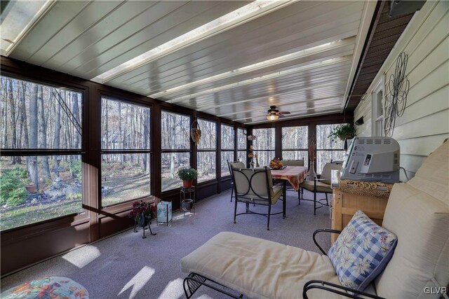 137 Outer Dr, Coolbaugh Twp, PA 18347 - sunroom featuring carpet, outdoor dining area, and healthy amount of natural light