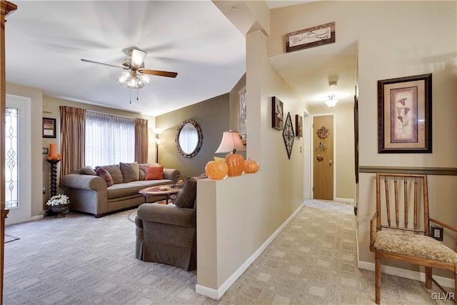 137 Outer Dr, Coolbaugh Twp, PA 18347 - living room featuring ceiling fan and light colored carpet
