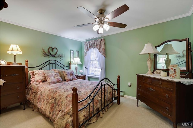 137 Outer Dr, Coolbaugh Twp, PA 18347 - bedroom with light carpet, ornamental molding, and ceiling fan