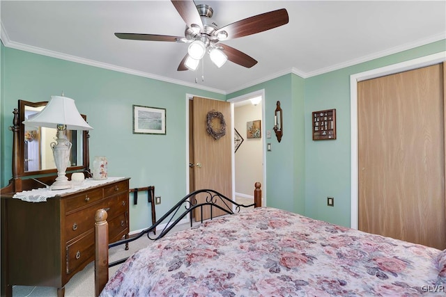 137 Outer Dr, Coolbaugh Twp, PA 18347 - bedroom featuring crown molding, carpet flooring, a ceiling fan, and a closet