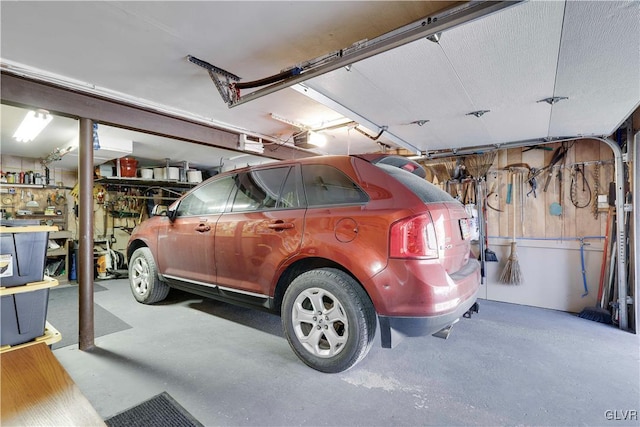137 Outer Dr, Coolbaugh Twp, PA 18347 - garage featuring a garage door opener