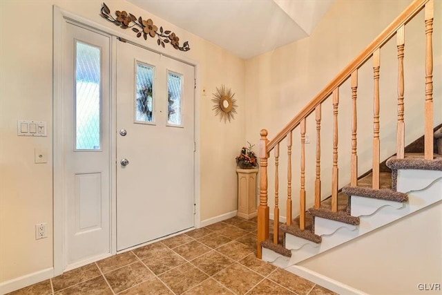 view of tiled foyer entrance