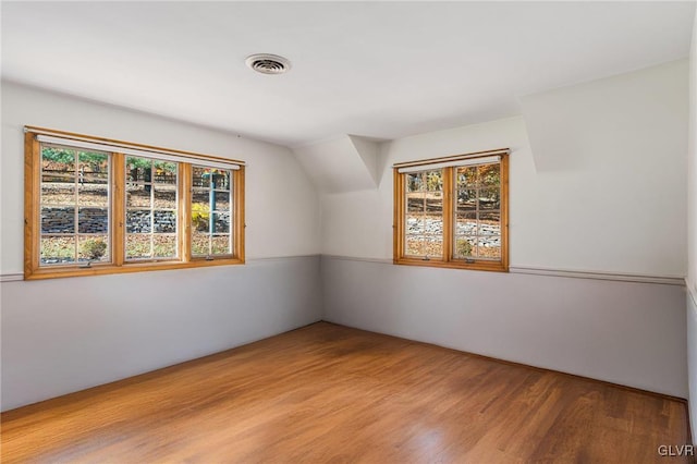 bonus room featuring light wood-type flooring