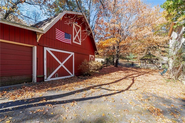 view of outdoor structure with a garage