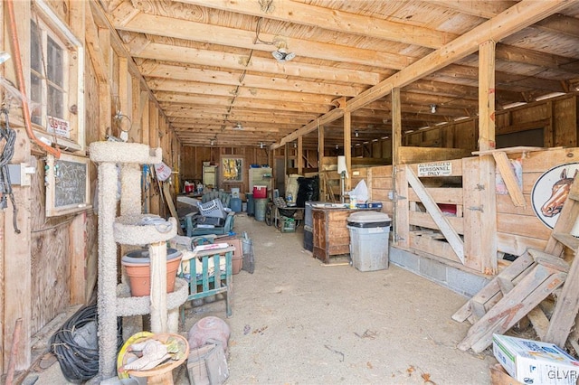 miscellaneous room featuring lofted ceiling