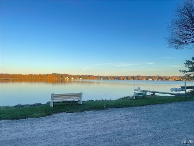 view of dock with a water view