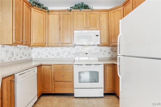 kitchen featuring white appliances