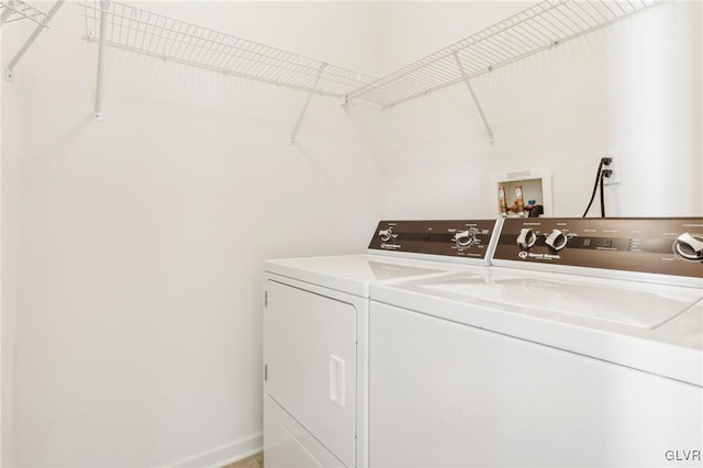 laundry room with independent washer and dryer