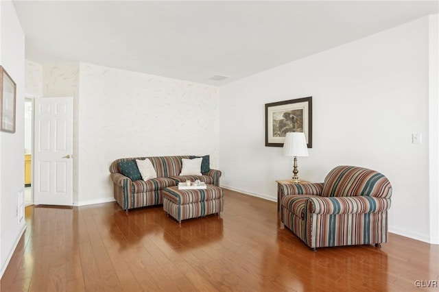 living area featuring hardwood / wood-style flooring