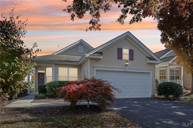 view of front of home with a garage