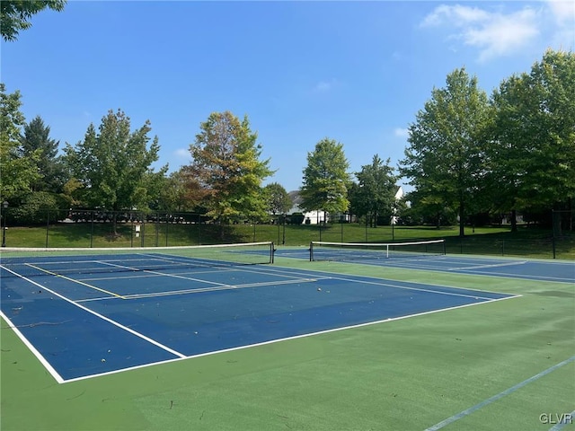 view of sport court with basketball hoop