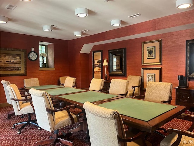 dining space featuring carpet flooring