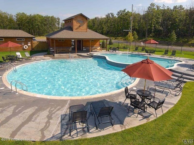 view of pool with a patio