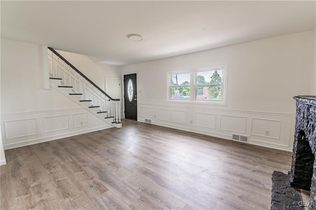 foyer featuring wood-type flooring