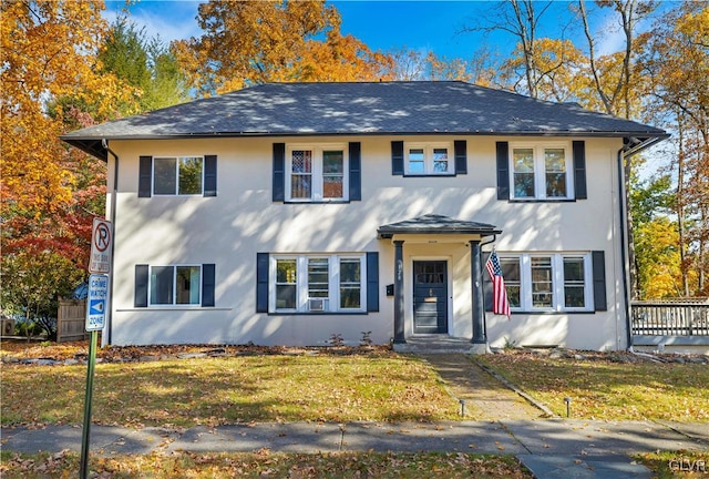 view of front of house with a front lawn