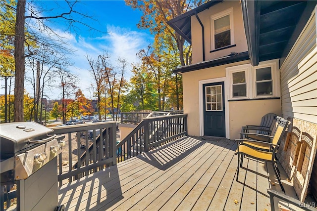 wooden terrace with grilling area