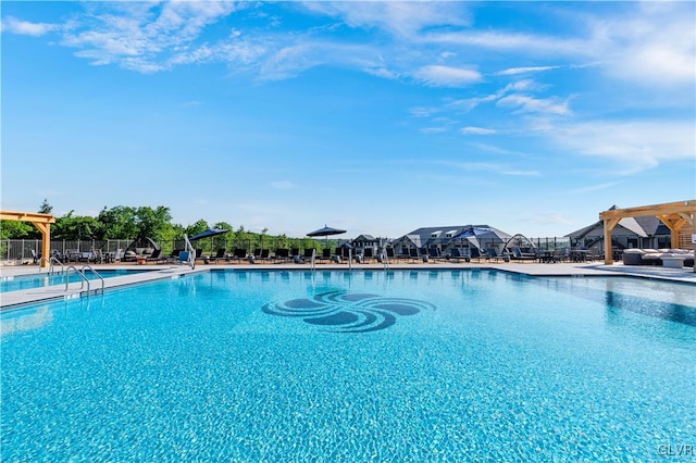 view of pool featuring a patio and a pergola