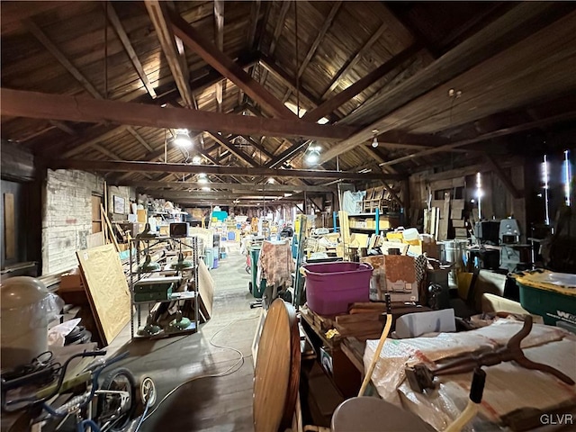 miscellaneous room featuring lofted ceiling