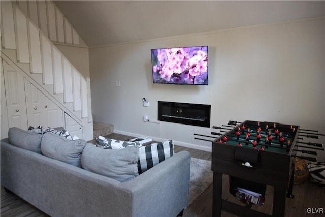 living room with lofted ceiling and dark wood-type flooring