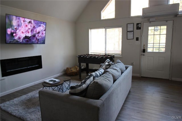 living room featuring high vaulted ceiling, wood-type flooring, and a wall mounted air conditioner