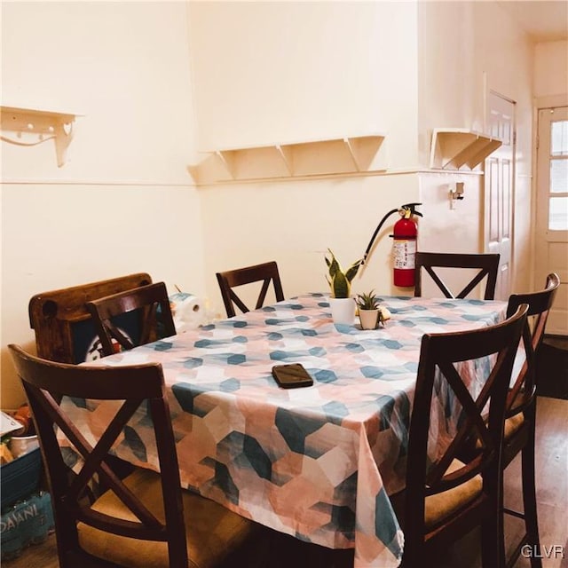 dining room with hardwood / wood-style floors