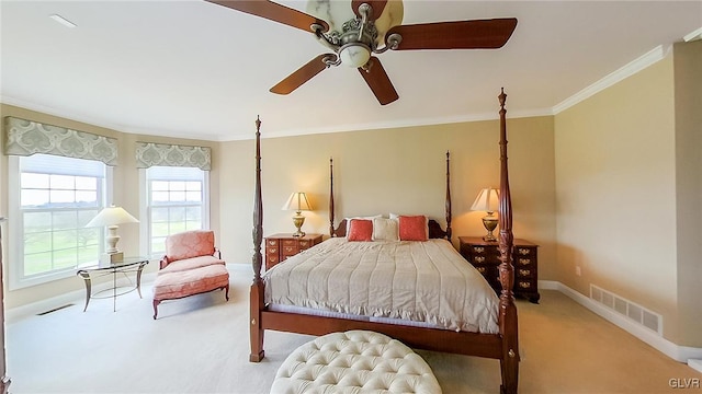 bedroom featuring carpet floors, ceiling fan, and ornamental molding