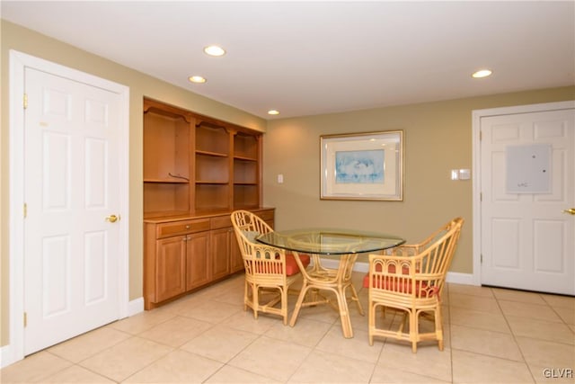 dining area featuring light tile patterned flooring