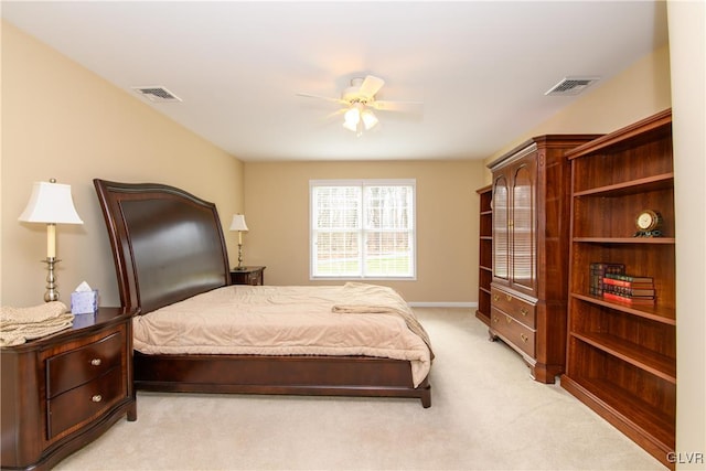 bedroom featuring ceiling fan and light colored carpet