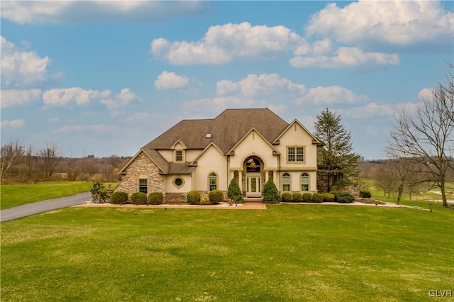 view of front facade with a front lawn