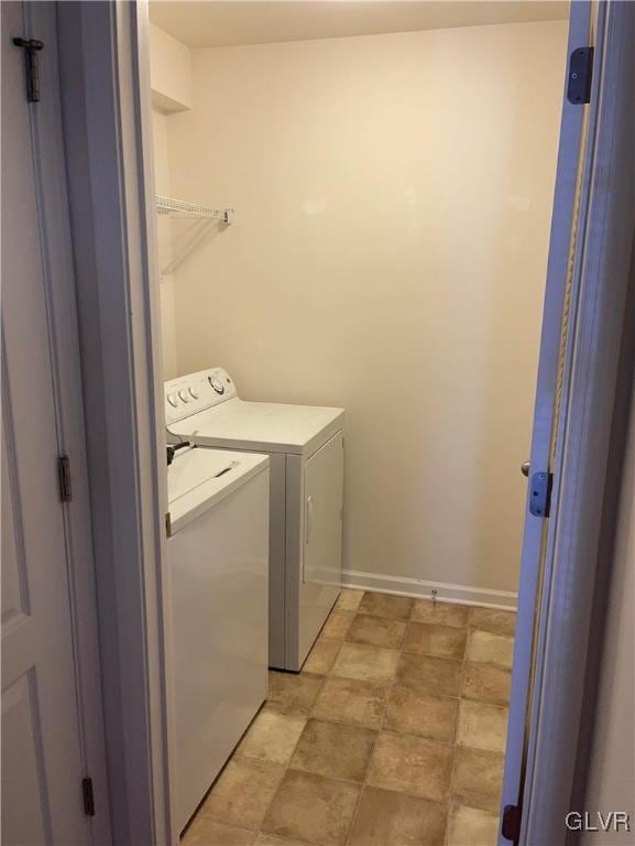 laundry room featuring independent washer and dryer