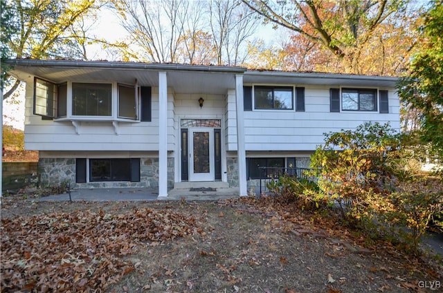 bi-level home with a patio