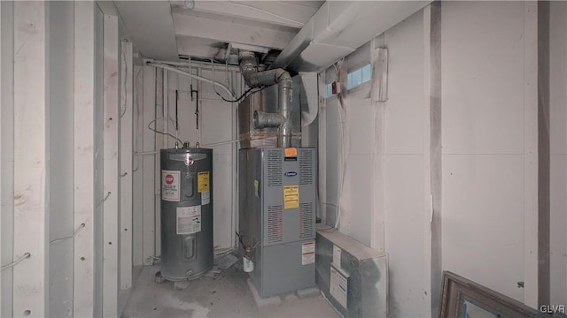 utility room featuring water heater