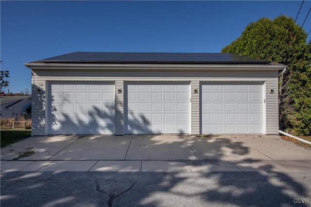 garage with solar panels