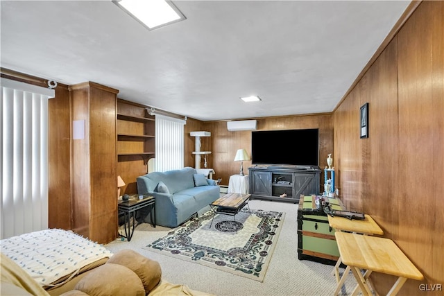 carpeted living room with ornamental molding, a wall mounted AC, wooden walls, and baseboard heating