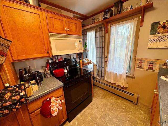 kitchen with black electric range and a baseboard radiator