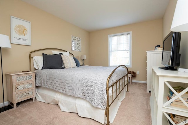 bedroom with light colored carpet