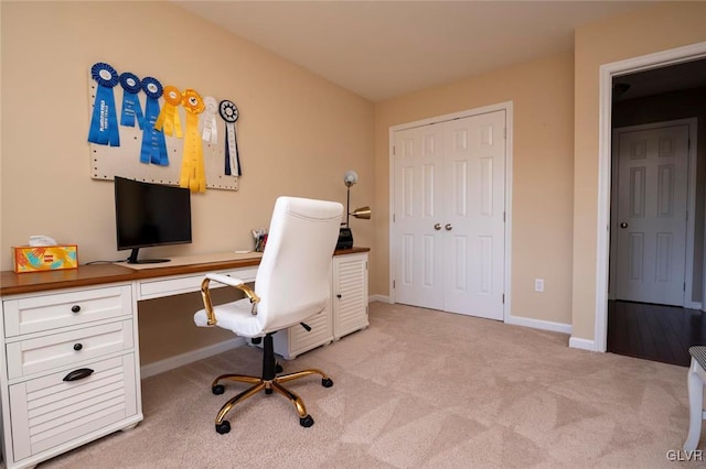 view of carpeted office space