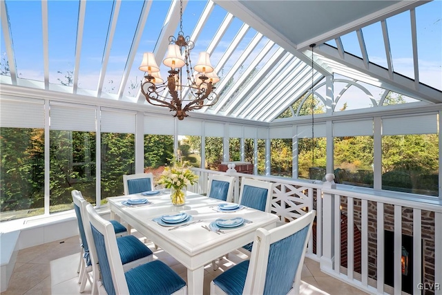 sunroom with an inviting chandelier