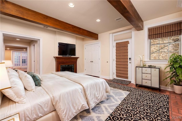 bedroom with beamed ceiling