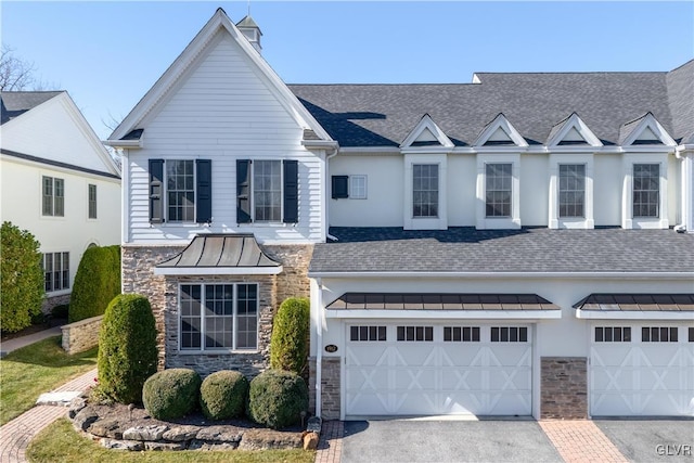 view of front of home with a garage